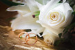 Gold wedding rings on flower