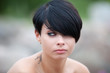 Foto: Young woman with tattoo Young woman with tattoo