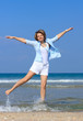 portrait of beautiful young woman on the beach