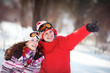 Girl and boy in winter park Girl and boy in winter park