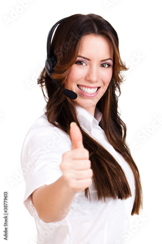 Photo: junge Frau mit Headset und Daumen Hoch Geste junge Frau mit Headset und Daumen Hoch Geste