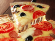 Pizza with ham, pepper and olives Pizza with ham, pepper and olives