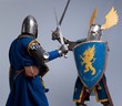 Two medieval knights fighting.