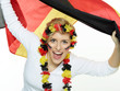 Foto: Beautiful german soccer fan cheers for the national team Beautiful german soccer fan cheers for the national team