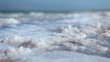 Stock Video Footage of salt deposits on the shore of the Dead Sea in Israel.