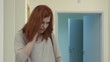 beautiful redhead pregnant girl talking on the phone