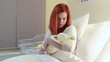 Redhead women with newborn baby