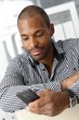 Man texting on mobile phone