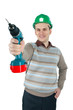 Worker holds a drill in his hand