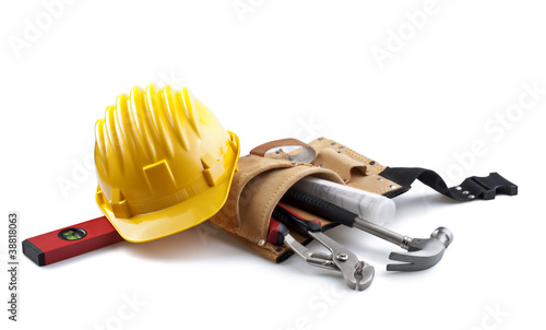 Photo: isolated hard hat with tools and blueprint on white isolated hard hat with tools and blueprint on white