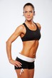 Beautiful athlete woman doing fitness exercise.