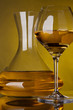 Glass full of wine and wine decanters Glass full of wine and wine decanters