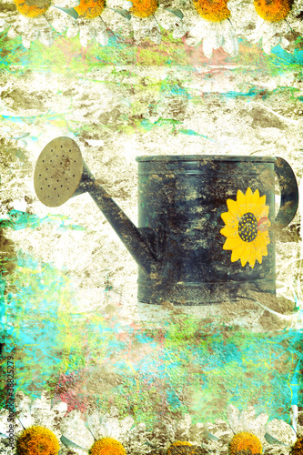 Photo: Aged metallic watering can background Aged metallic watering can background