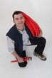Plumber with pipe and a wrench
