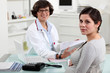 A pregnant woman at her gynaecologist.