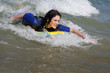 Woman bodyboarding