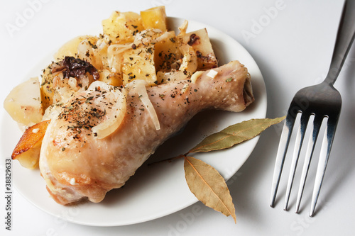 Photo: Grilled chicken wings served with potato Grilled chicken wings served with potato