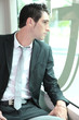 Businessman going to work on tram