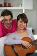 a young couple relaxing in a lounge