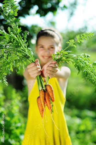 Photo: Girl with carrots Girl with carrots