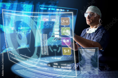 Photo: Doctor with screens Doctor with screens