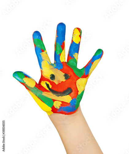 Foto: bunte Kinderhand mit Smiley bunte Kinderhand mit Smiley