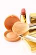 gold make up collection on white background gold make up collection on white background