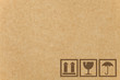 Safety fragile icon on cardboard paper box with space Safety fragile icon on cardboard paper box with space