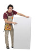Carpenter pointing to a blank board