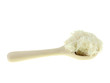 cooked rice on a wooden spoon cooked rice on a wooden spoon