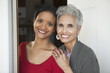 Photo: Mother and daughter at the front door Mother and daughter at the front door