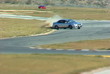 Video: Race Car Loses Control on Track Race Car Loses Control on Track