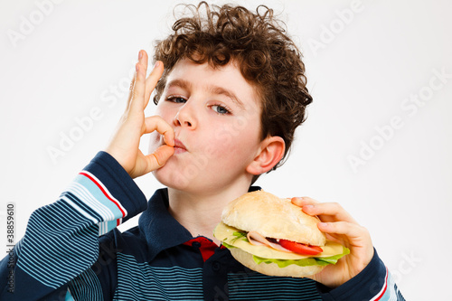 Photo: Boy eating big sandwich Boy eating big sandwich