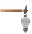 hammer breaks while hitting light bulb concept of strong idea