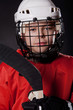 Portrait of a young smiling ice hockey player