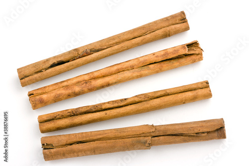 Photo: Cinnamon sticks on white Cinnamon sticks on white