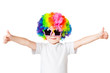 portrait of a boy in colored wig and glasses