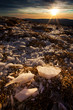 Sunrise in the mountains with ice in the foreground Sunrise in the mountains with ice in the foreground