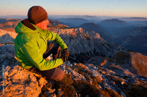 Photo: Young man enjoying autumn mountain view Young man enjoying autumn mountain view