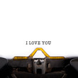 "I LOVE YOU" message typed by vintage typewriter.