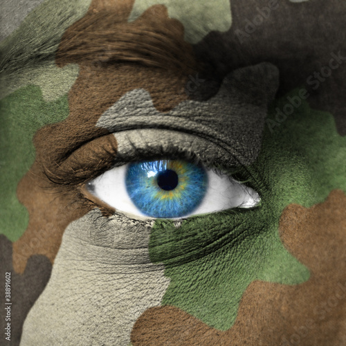 Photo: Army camouflage on human face Army camouflage on human face