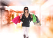 Shopping young woman in the shopping mall.