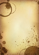 Classic vintage background. Old paper sheet with stains of coffe Classic vintage background. Old paper sheet with stains of coffe
