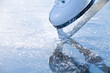 Photo: Woman skates braking ice, frazil flying around Woman skates braking ice, frazil flying around