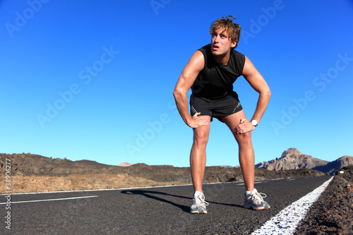 Photo: Jogger resting after running Jogger resting after running