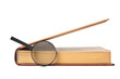 book and magnifying glass isolated