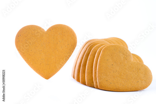 Photo: Gingerbread hearts isolated on white Gingerbread hearts isolated on white