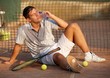 Exhausted tennis player on ground Exhausted tennis player on ground