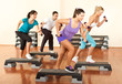 Stepping with dumbbells Stepping with dumbbells