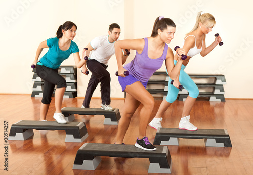Photo: Stepping with dumbbells Stepping with dumbbells